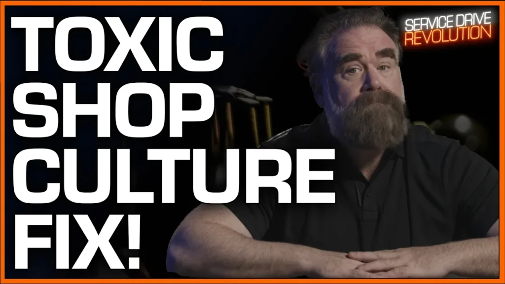 sitting at a desk discussing how to fix toxic shop culture, from the Service Drive Revolution show.
