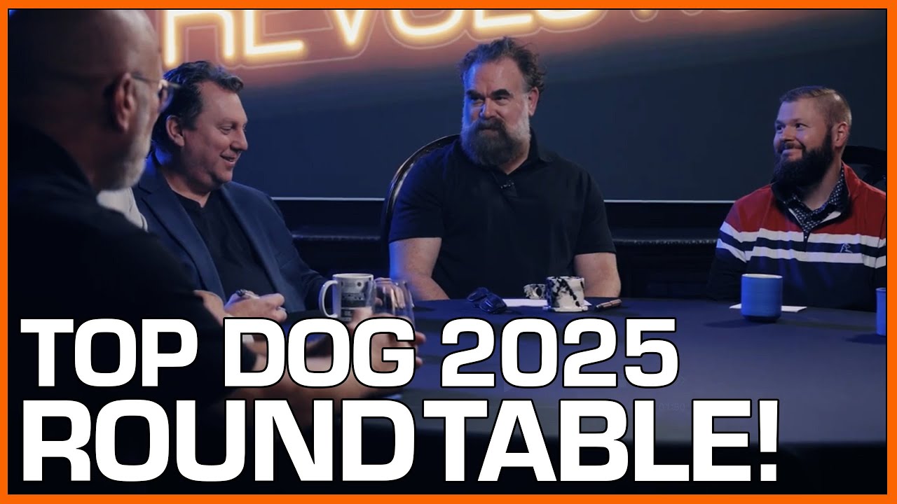 Group of automotive leaders sitting at a roundtable discussing Top Dog 2025 topics on a video podcast set.